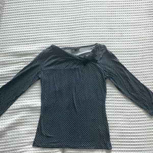 Navy blue top with white dots, long sleeves, nice neck cut
